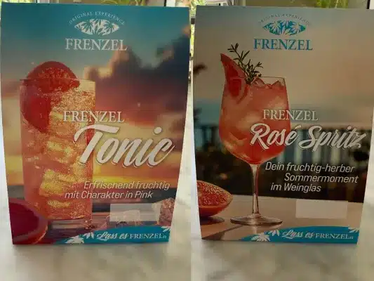 FRENZEL Tischaufsteller für Rosé Spritz und Tonic in der Außengastronomie, hochwertig am POS im Einsatz.